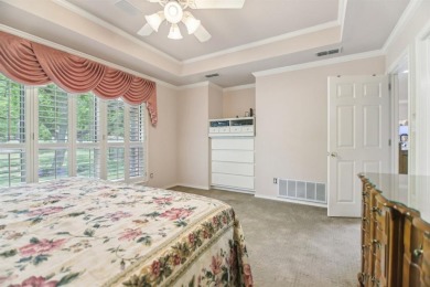 Walk out to the golf course from your large screened in back on Pecan Plantation Country Club in Texas - for sale on GolfHomes.com, golf home, golf lot