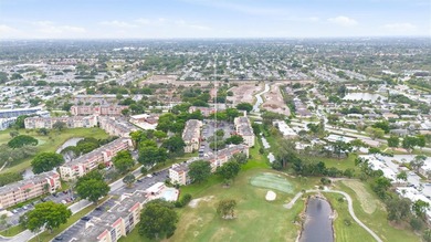 MOTIVATED SELLER! Spacious 2BR/2BA second-floor condo in the on Oriole Golf and Tennis Club in Florida - for sale on GolfHomes.com, golf home, golf lot