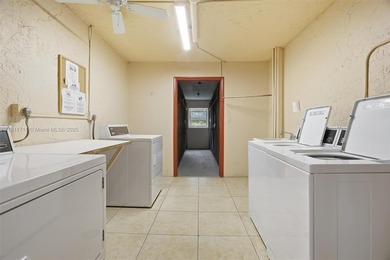 MOTIVATED SELLER! Spacious 2BR/2BA second-floor condo in the on Oriole Golf and Tennis Club in Florida - for sale on GolfHomes.com, golf home, golf lot