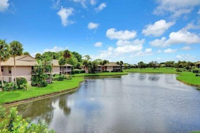 RENOVATED, VIEWS & BARGAIN-PRICED.  Fabulous lake vistas & an on Boca West Golf and Country Club in Florida - for sale on GolfHomes.com, golf home, golf lot