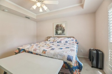 Walk out to the golf course from your large screened in back on Pecan Plantation Country Club in Texas - for sale on GolfHomes.com, golf home, golf lot