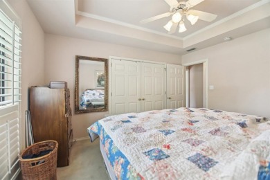 Walk out to the golf course from your large screened in back on Pecan Plantation Country Club in Texas - for sale on GolfHomes.com, golf home, golf lot