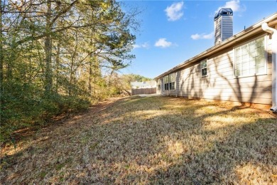 Welcome to this meticulously maintained ranch-style home in the on Canongate At Heron Bay in Georgia - for sale on GolfHomes.com, golf home, golf lot