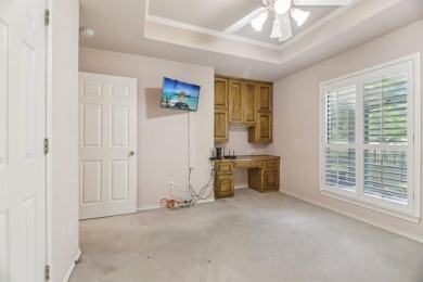 Walk out to the golf course from your large screened in back on Pecan Plantation Country Club in Texas - for sale on GolfHomes.com, golf home, golf lot