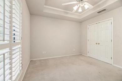Walk out to the golf course from your large screened in back on Pecan Plantation Country Club in Texas - for sale on GolfHomes.com, golf home, golf lot