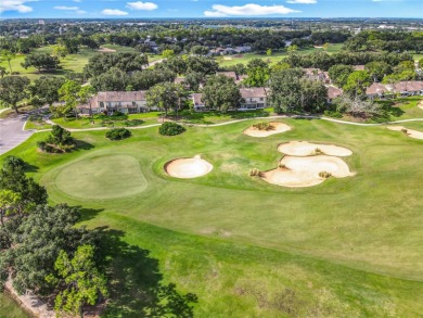 Located in the desirable guard gated Southern Dunes Golf on Southern Dunes Golf and Country Club in Florida - for sale on GolfHomes.com, golf home, golf lot