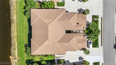Nestled in a quiet cul-de-sac with beautiful lake views, this on Pelican Preserve Golf Club in Florida - for sale on GolfHomes.com, golf home, golf lot