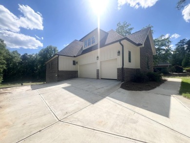 Golf course frontage for this stunning 3 car garage home with an on The Golf Club At Cedar Creek in South Carolina - for sale on GolfHomes.com, golf home, golf lot