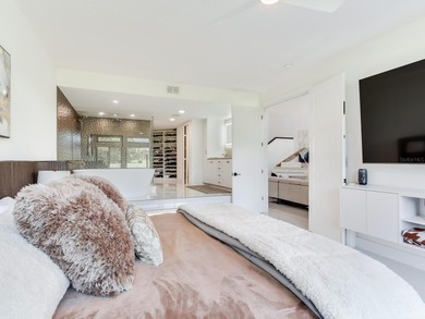 Welcome to this luxury villa located in the prestigious 24-hour on Cypress Run Golf Club  in Florida - for sale on GolfHomes.com, golf home, golf lot