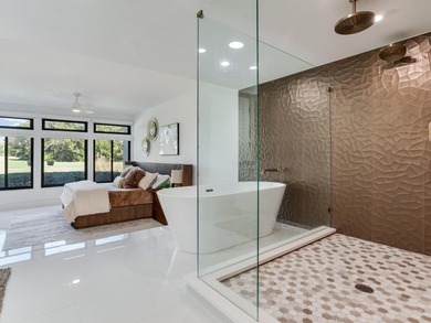 Welcome to this luxury villa located in the prestigious 24-hour on Cypress Run Golf Club  in Florida - for sale on GolfHomes.com, golf home, golf lot