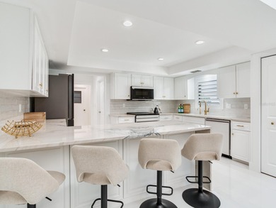 Welcome to this luxury villa located in the prestigious 24-hour on Cypress Run Golf Club  in Florida - for sale on GolfHomes.com, golf home, golf lot