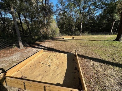 You will love this beautifully crafted custom home in Citrus on Citrus Springs Country Club in Florida - for sale on GolfHomes.com, golf home, golf lot