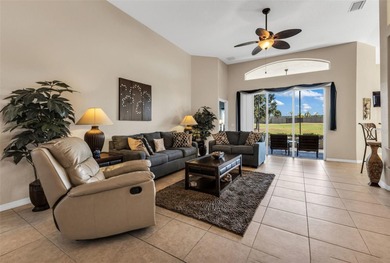 GORGEOUS ASHTON floor plan with 2 1/2 car garage - large lanai - on Kings Gate Golf Club in Florida - for sale on GolfHomes.com, golf home, golf lot