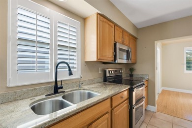 The ENCLOSED FLORIDA ROOM Under Heat and Air adds almost 450 sq on Highland Lakes Executive Golf Course in Florida - for sale on GolfHomes.com, golf home, golf lot