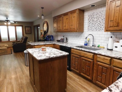 Discover this beautiful 3-bedroom, 2.5-bath home, perfectly on Blackmer Municipal Golf Course in Oklahoma - for sale on GolfHomes.com, golf home, golf lot