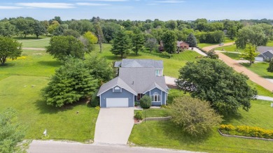 Welcome to your new home, ideally situated on a corner lot and on Lake Panorama National Golf Course in Iowa - for sale on GolfHomes.com, golf home, golf lot