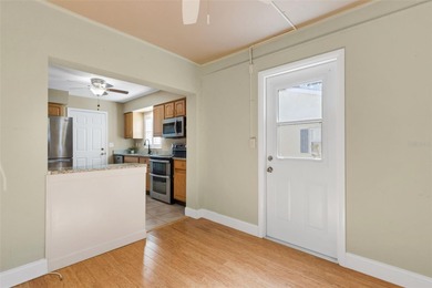 The ENCLOSED FLORIDA ROOM Under Heat and Air adds almost 450 sq on Highland Lakes Executive Golf Course in Florida - for sale on GolfHomes.com, golf home, golf lot