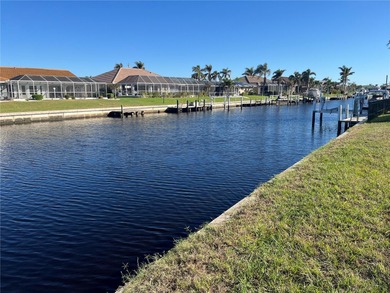 If you are looking for waterfront living with a small community on Saint Andrews South Golf Club in Florida - for sale on GolfHomes.com, golf home, golf lot