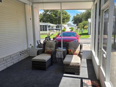 THIS PALM HARBOR 3/2 SPLIT PLAN FEATURES OVER 1300 SQ FT AND HAS on Southport Springs Golf Club in Florida - for sale on GolfHomes.com, golf home, golf lot