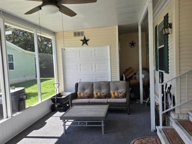 THIS PALM HARBOR 3/2 SPLIT PLAN FEATURES OVER 1300 SQ FT AND HAS on Southport Springs Golf Club in Florida - for sale on GolfHomes.com, golf home, golf lot