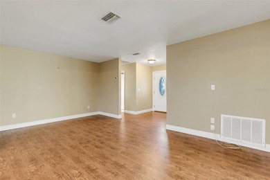 The ENCLOSED FLORIDA ROOM Under Heat and Air adds almost 450 sq on Highland Lakes Executive Golf Course in Florida - for sale on GolfHomes.com, golf home, golf lot