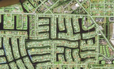 If you are looking for waterfront living with a small community on Saint Andrews South Golf Club in Florida - for sale on GolfHomes.com, golf home, golf lot