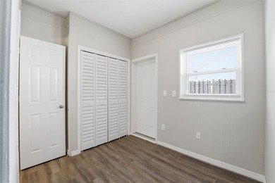 This beautifully maintained three-bedroom, two-bath home with a on The Dunedin Country Club in Florida - for sale on GolfHomes.com, golf home, golf lot