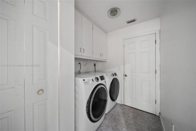 Located on a large corner lot along a peaceful canal, this on Spring Lake Golf Resort in Florida - for sale on GolfHomes.com, golf home, golf lot