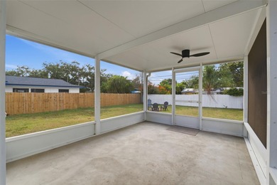 This beautifully maintained three-bedroom, two-bath home with a on The Dunedin Country Club in Florida - for sale on GolfHomes.com, golf home, golf lot