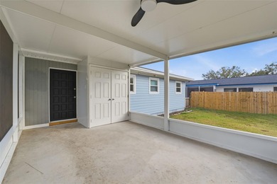 This beautifully maintained three-bedroom, two-bath home with a on The Dunedin Country Club in Florida - for sale on GolfHomes.com, golf home, golf lot