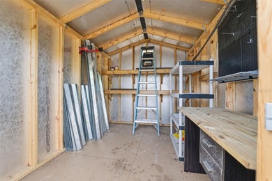 This beautifully maintained three-bedroom, two-bath home with a on The Dunedin Country Club in Florida - for sale on GolfHomes.com, golf home, golf lot