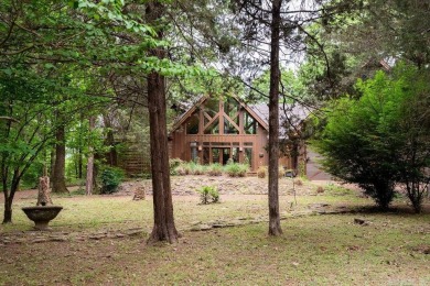 Nestled within the prestigious Tannenbaum Resort, this stunning on Tannenbaum Golf Club in Arkansas - for sale on GolfHomes.com, golf home, golf lot