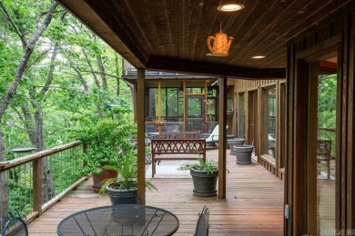 Nestled within the prestigious Tannenbaum Resort, this stunning on Tannenbaum Golf Club in Arkansas - for sale on GolfHomes.com, golf home, golf lot
