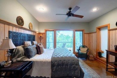 Nestled within the prestigious Tannenbaum Resort, this stunning on Tannenbaum Golf Club in Arkansas - for sale on GolfHomes.com, golf home, golf lot