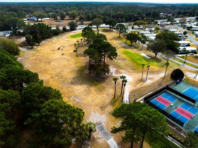 Welcome to Resort Style Living! KOVE ESTATE is a 55+ CO-OP on Cypress Point RV Golf Club in Florida - for sale on GolfHomes.com, golf home, golf lot