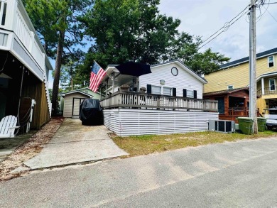 2 BED/1.5 BATH BEACH HOUSE WITH WRAPAROUND COMPOSITE DECKING on Prestwick Country Club in South Carolina - for sale on GolfHomes.com, golf home, golf lot
