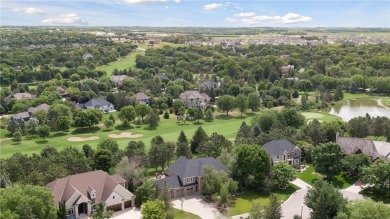 Situated on a  1/2 -acre lot overlooking the 5th hole of on Prestwick Golf Club At Wedgewood in Minnesota - for sale on GolfHomes.com, golf home, golf lot