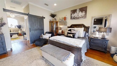 Beautifully situated on 2.3 private acres in the gated, golfing on Pecan Plantation Country Club in Texas - for sale on GolfHomes.com, golf home, golf lot