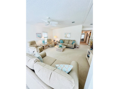 Welcome to this beautifully cared-for home in the gated golf on Pine Lakes Country Club in Florida - for sale on GolfHomes.com, golf home, golf lot