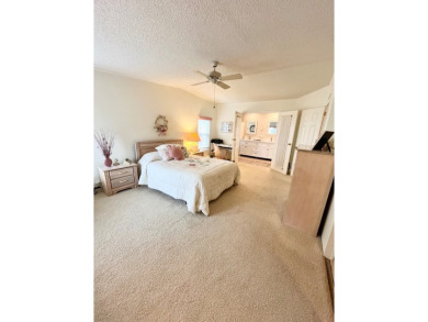 Welcome to this beautifully cared-for home in the gated golf on Pine Lakes Country Club in Florida - for sale on GolfHomes.com, golf home, golf lot