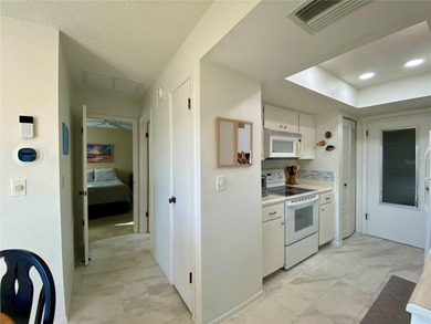 Under contract-accepting backup offers. Sunlight pours into this on Highland Lakes Executive Golf Course in Florida - for sale on GolfHomes.com, golf home, golf lot