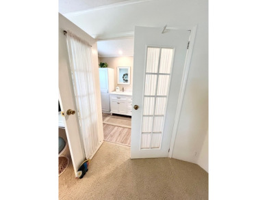 Welcome to this beautifully cared-for home in the gated golf on Pine Lakes Country Club in Florida - for sale on GolfHomes.com, golf home, golf lot