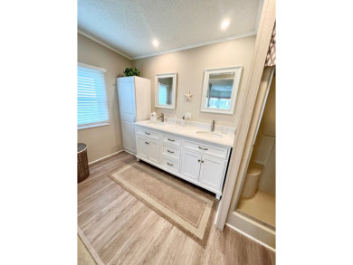 Welcome to this beautifully cared-for home in the gated golf on Pine Lakes Country Club in Florida - for sale on GolfHomes.com, golf home, golf lot