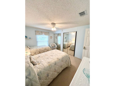 Welcome to this beautifully cared-for home in the gated golf on Pine Lakes Country Club in Florida - for sale on GolfHomes.com, golf home, golf lot