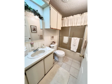 Welcome to this beautifully cared-for home in the gated golf on Pine Lakes Country Club in Florida - for sale on GolfHomes.com, golf home, golf lot