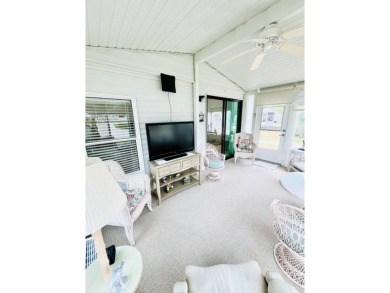 Welcome to this beautifully cared-for home in the gated golf on Pine Lakes Country Club in Florida - for sale on GolfHomes.com, golf home, golf lot