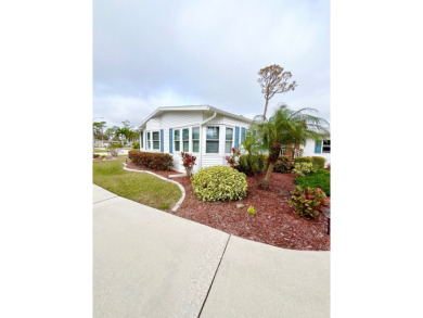 Welcome to this beautifully cared-for home in the gated golf on Pine Lakes Country Club in Florida - for sale on GolfHomes.com, golf home, golf lot