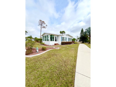 Welcome to this beautifully cared-for home in the gated golf on Pine Lakes Country Club in Florida - for sale on GolfHomes.com, golf home, golf lot