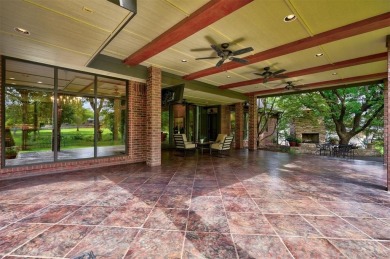 Exquisitely crafted custom residence on the 12th fairway of the on Oak Tree National Golf and Country Club in Oklahoma - for sale on GolfHomes.com, golf home, golf lot