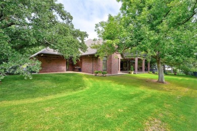 Exquisitely crafted custom residence on the 12th fairway of the on Oak Tree National Golf and Country Club in Oklahoma - for sale on GolfHomes.com, golf home, golf lot